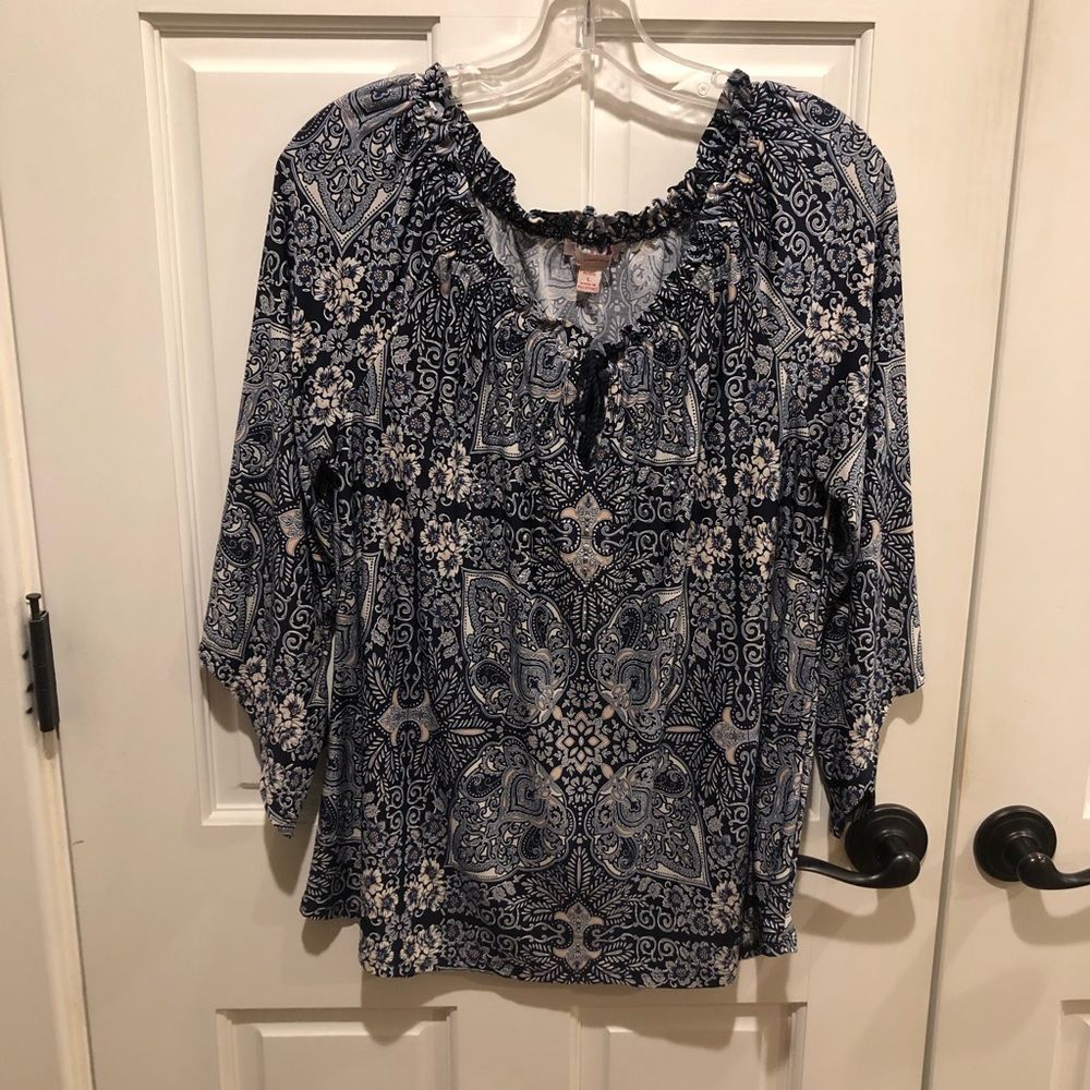 DB three quarter sleeved blue top.